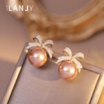 Bow sparkle diamond pearl stud earrings - Image 2