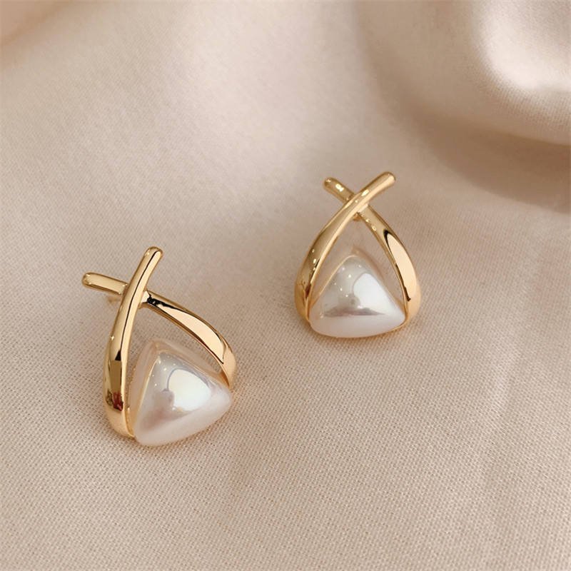 Hdc5f07770b484fa4b4a3d32e5a7810f5F Trendy Korean Cross Pearl Earrings – Sculpted Design (AVT-114) - Image 1