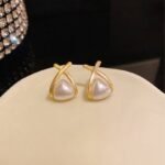 Trendy Korean Cross Pearl Earrings – Sculpted Design (AVT-114) - Image 4